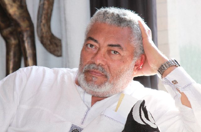 JJ Rawlings with hand to hind head